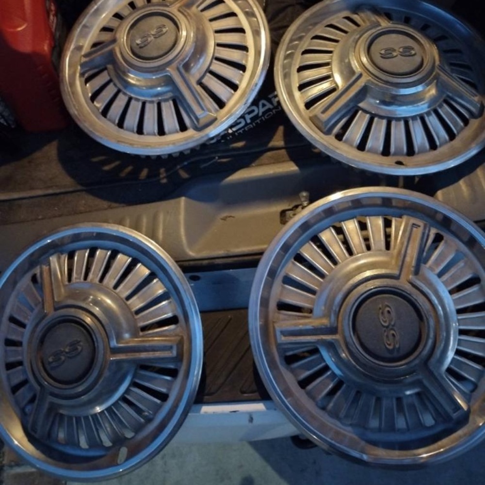 Classic Chevrolet Malibu four of caps 1970 to 1972 SS. Hub caps NOS